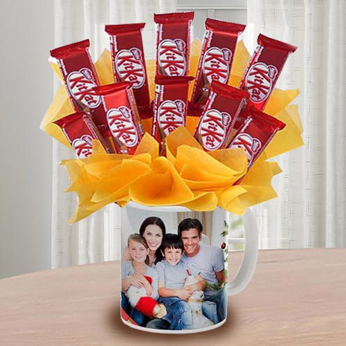 Exclusive Kitkat Chocolates Arrangement in Personalized Coffee Mug