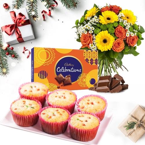 Delightful X mas Gift of Muffins with Chocolates n Flowers Bouquet