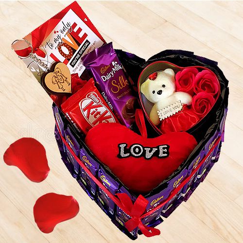 Splendid Combo of Hearty Cushion n Teddy with Mixed Chocolates n Art Roses with Love Card