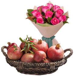 Lovely Pink Roses Bouquet with Pomegranates in Basket