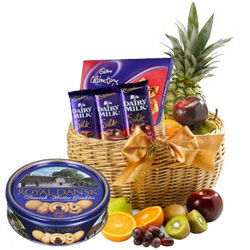 Enticing Fresh Fruits Basket with Danish Cookies N Chocolates