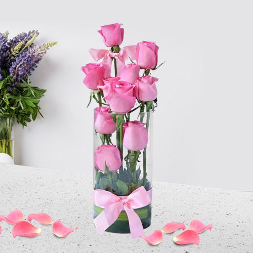 Beautiful Display of Pink Roses in Glass Vase