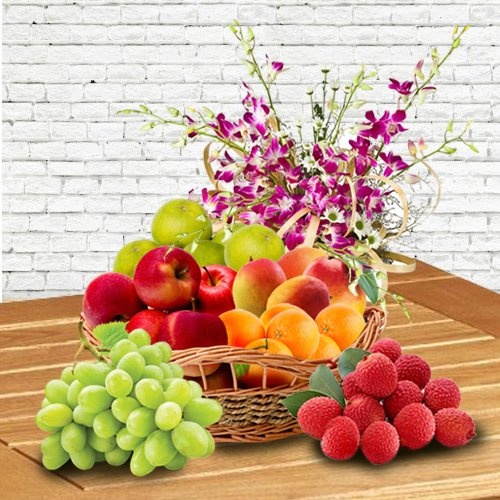 Basket of Fresh Fruits decorated with Orchids