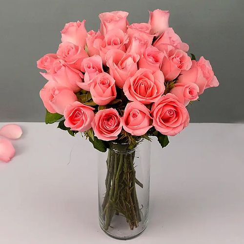 Exotic Display of Pink Roses in a Crystal Vase	
