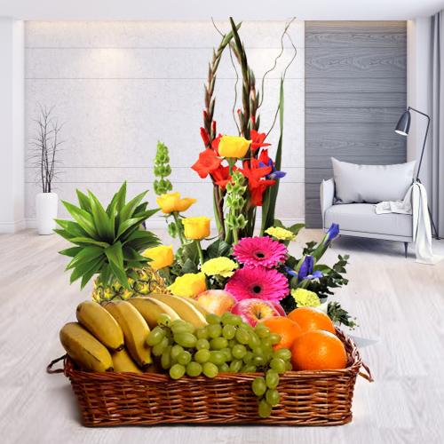 Delectable Fresh Fruits Basket with Flowers