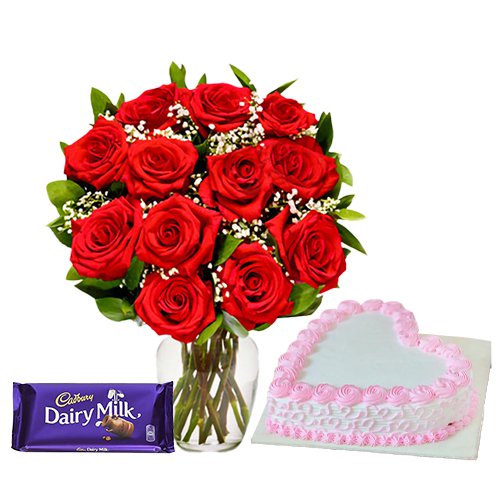 MidNight Delivery ::12 Exclusive  Dutch Red    Roses  in vase and  A Fresh Baked Heart Shaped Cake 1 Lb and  a Cadburys Chocolate.
