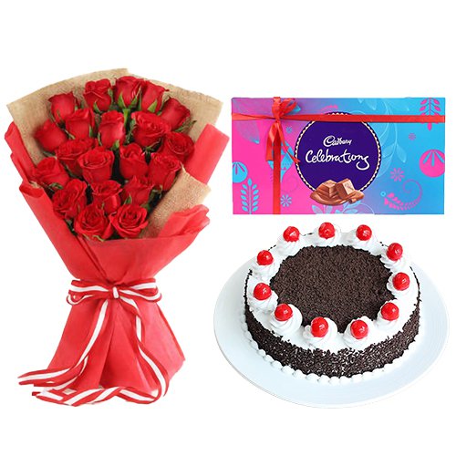 MidNight Delivery ::18 Dutch Red Roses Bouquet with 1 Lbs. Black Forest Cake and 1 Cadbury's Celebration Pack