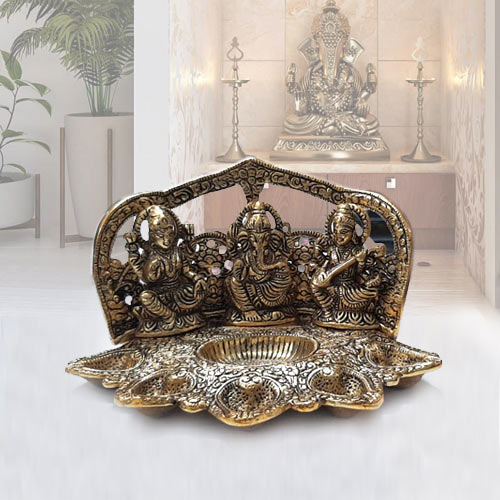 Attractive Metallic Diya with Ganesh Lakshmi N Saraswati Idol