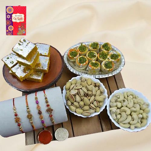 Remarkable Set of 4 Rakhis with Haldiram Sweets N Assorted Dry Fruits