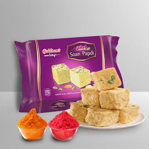 Nicely Gift Wrapped Soan Papdi  from Haldiram with free Gulal/Abir Pouch. 
